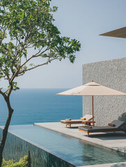 Infinity pool overlooking tranquil ocean at luxury resort