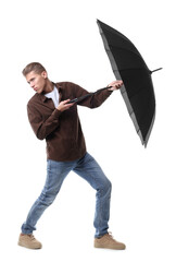 Man with black umbrella on white background