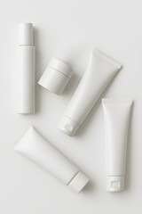 Minimalist White Cosmetic Bottles Arrangement Mockup – Clean Beauty Product Display