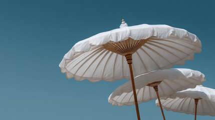 Traditional white Balinese umbrellas.