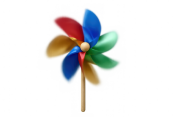 Vibrant pinwheel rotating, generating blurred motion and evoking nostalgic childhood whimsy against transparent backdrop