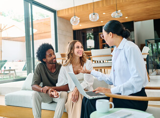 Young couple listening their financial advisor  or a real estate agent who is using laptop during a...