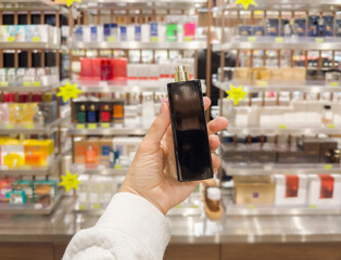  buying make up at cosmetics section in store. choosing cosmetics, perfumes, creams and shampoos, Using tester.