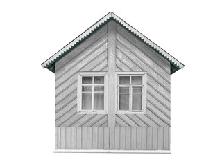 Small wooden house with white wooden chevron siding is isolated.