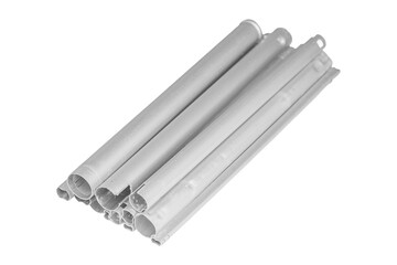 Set of used damaged aluminium pipes is isolated.