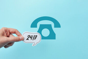 Inscription: 24/7, the concept of 24/7 assistance, services, and actions