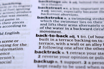 Close Up Of English Dictionary Page With Definition Word -Back-to-Back