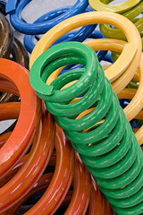 Group of coil springs of different sizes and colors