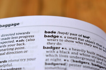 Close Up Of English Dictionary Page With Definition Word -Bade