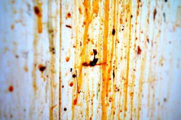 Grease on wall kitchen. Oil Stains on Wall background. Grease spots, dirt stains on wall tiles in old, filthy kitchen, splashes of grunge, oil use cooking. Dried blood on wall. Wash kitche Grease dirt