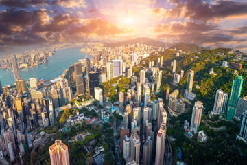 Aerial panorama top wide view of forest peak slope and view of high-rise skyscrapers of central...