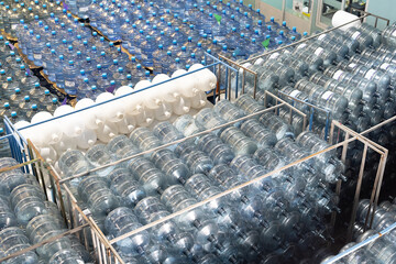 Drinking water production plant. 20l plastic pure water. Manufacturers of 20 litres bottles. 20...
