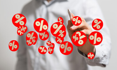 Image of a person interacting with percentage symbols, ideal for finance, business, or sales concepts.