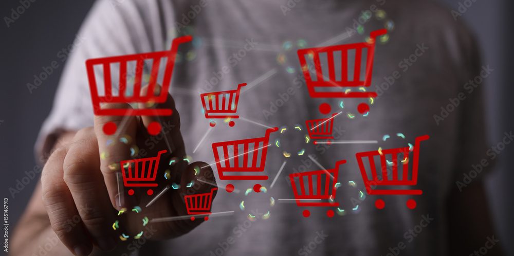 Poster hand interacts with a digital network of shopping carts, symbolizing online shopping and e-commerce.