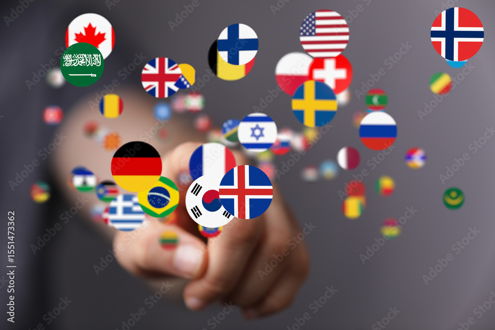 Poster hand interacting with digital flags, representing international connectivity.