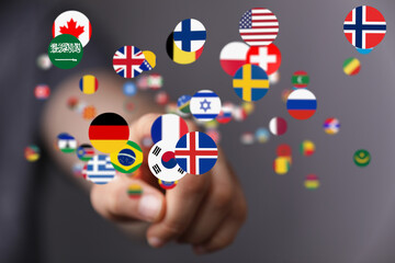 Hand interacting with digital flags, representing international connectivity.