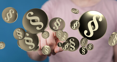 Abstract image of paragraph symbols hovering near a hand, ideal for legal or law-related topics.