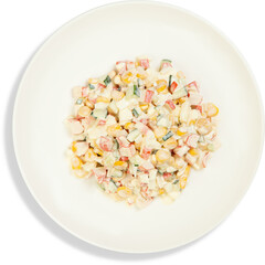 A white plate topped with a colorful salad on a white background