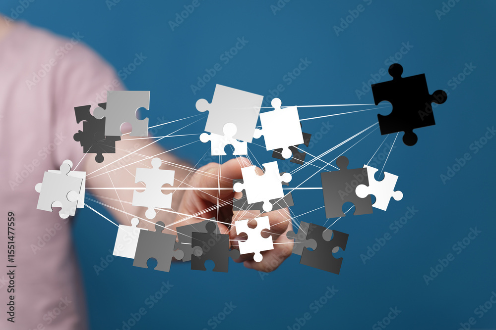 Aufkleber Abstract image of interconnected puzzle pieces, symbolizing teamwork, problem-solving, and collaboration.
