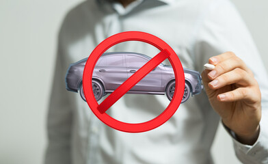 Image of a red circle with a line through a car, symbolizing a vehicle ban or restriction.