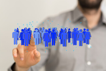 A hand interacts with a digital network of people, illustrating social connections and community.