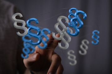 Abstract 3D rendering of paragraph symbols, ideal for legal, law, and justice concepts.