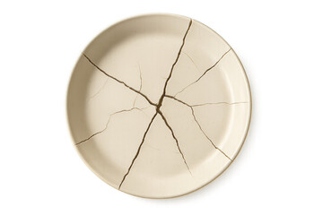 Broken white plate isolated on transparent background representing loss and damage