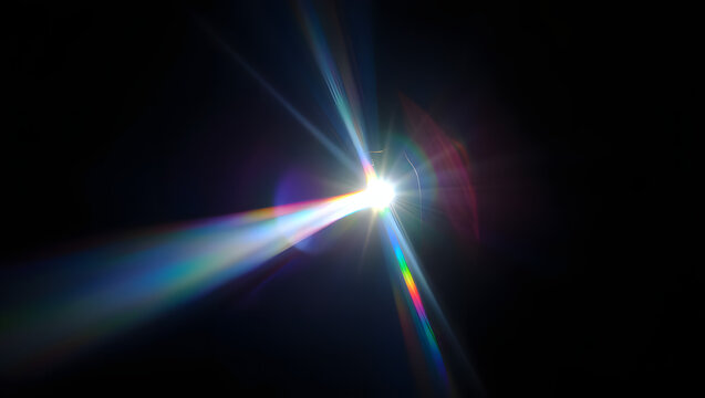 A vibrant lens flare effect creates a streak of light across a dark background 