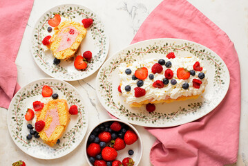Gluten Free Sponge Roll with Cream and Summer Berries.top veiw