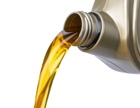 Golden motor oil is being poured from a silver container, showing a smooth, flowing liquid stream.