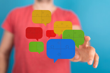 Colorful puzzle pieces in speech bubbles illustrate teamwork, communication, and problem-solving.