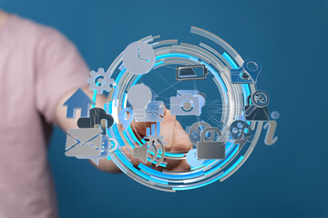Person interacts with a digital interface showing various app icons, representing global...