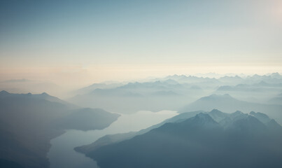Fototapeta premium tranquil mountain lake at sunset. Empty space for text