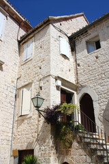 Picturesque Mediterranean street and traditional architectural details in Trogir, Croatia.