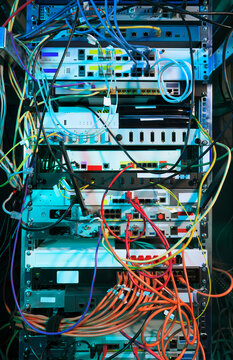 Complex network cables and equipment in a server room