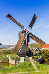 Historic windmill Ter Leede on the dike in Leerdam, Netherlands