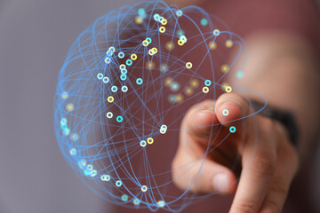 Abstract image of a hand interacting with a digital network. Ideal for technology, connection, and...