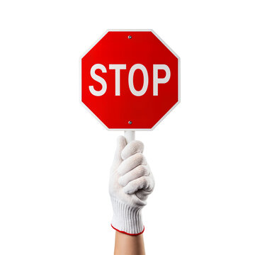 A gloved hand holds a red octagonal stop sign against a transparent background. The sign features bold white letters spelling 'STOP'.