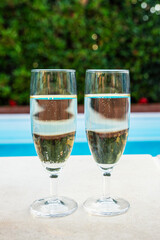 Two glasses of sparkling champagne toasting for a romantic celebration or anniversary