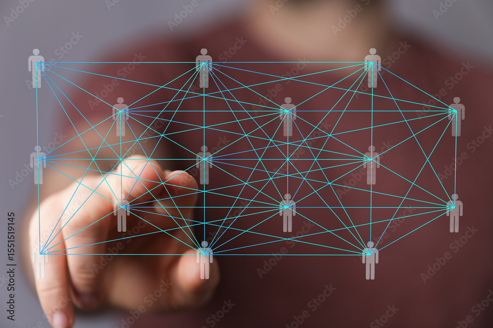 Poster A hand interacts with a digital network visualization, showcasing interconnectedness.