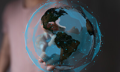Abstract image of a hand holding a digital earth, representing global connectivity and networking.