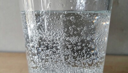 Sparkling Water Bubbles Closeup Glass Drink.