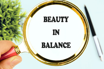 The conceptual phrase BEAUTY IN BALANCE, self care concept copy space