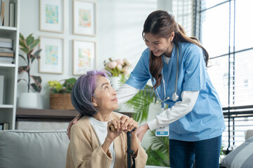 Mental health and elderly care concept.Close up hands of helping hands elderly home care.Arthritis person's hand in support of geriatric doctor or nursing caregiver.Mother and daughter.