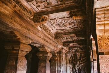 Intricately carved temple ceiling with traditional Indian motifs at Badami, Karnataka, India.