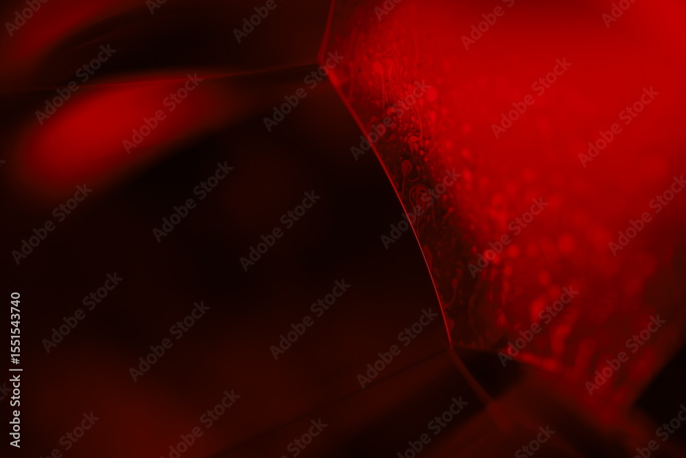 Fototapete red reflections of liquid in macro, red liquid surface, bubbles in macro, connection of bubbles in m