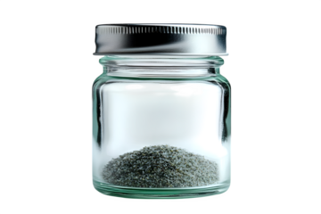 Clear glass spice jar with shaker top isolated on white background