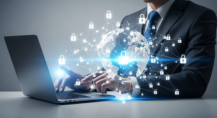 Businessman working on a laptop with global network security and data protection concept.