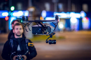 Drone lands on the street flying around city