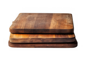 Stack of three rustic wooden cutting boards food preparation serving trays kitchenware isolated on transparent background